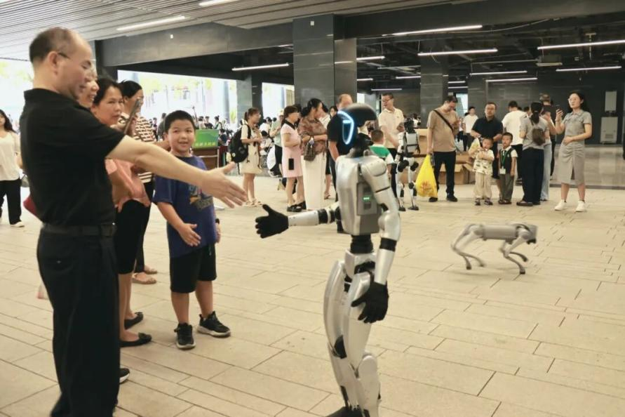  Smart robots welcome new students at university in Guangzhou