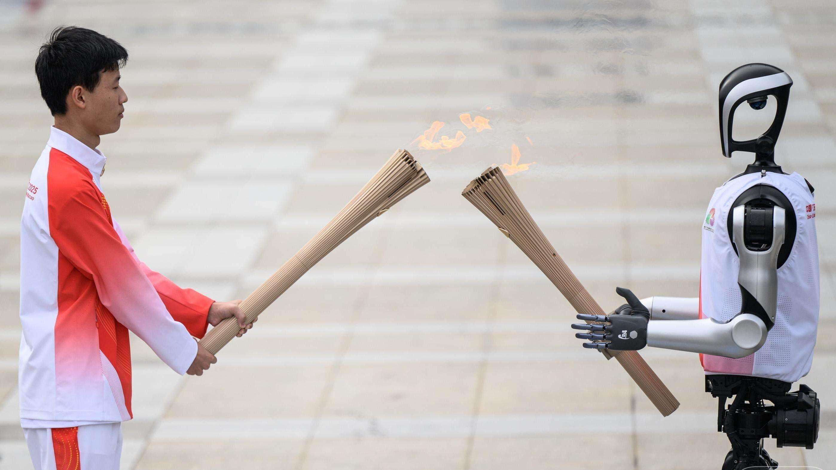 Opinion | Why does 15th National Games torch lit with combustible ice and passed from robot to human matter?